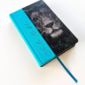 BIBLIA RV60, TAPA DURA. AZUL CON CARA DE LEON